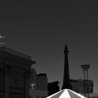 An intricate black and white illustration of a cityscape.