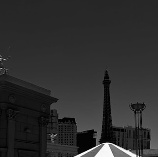 An intricate black and white illustration of a cityscape.