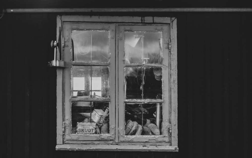 gray scale photo of glass window