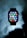 An Apple Watch is prominently displayed with its user interface showing numerous colorful app icons. The watch is set against a cloudy, dark background, giving it a floating appearance.