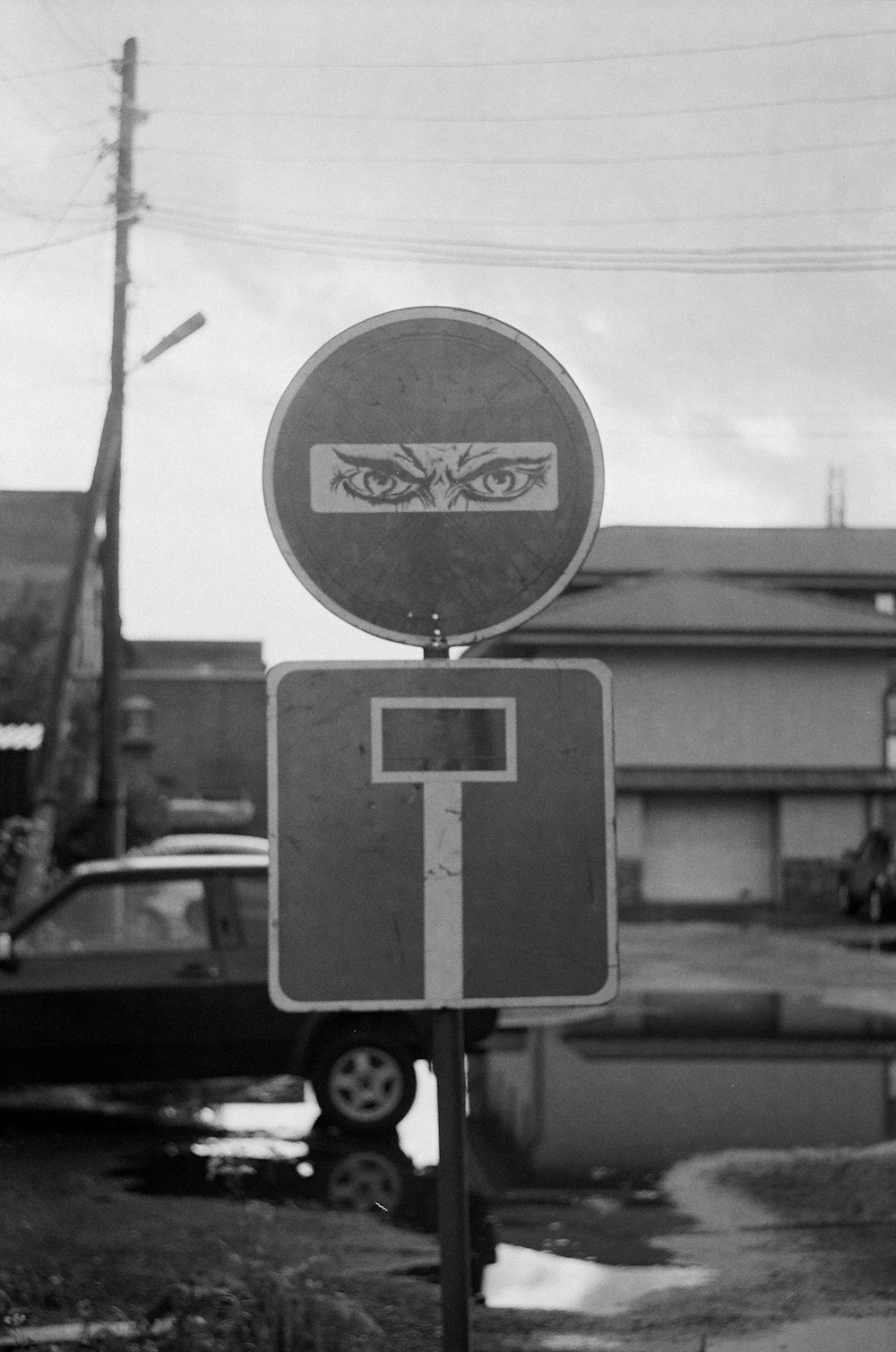 grayscale photo of no smoking sign