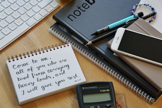 white paper document beside black click pen