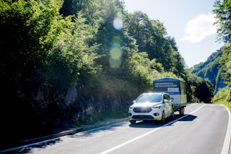 white car on road during daytime