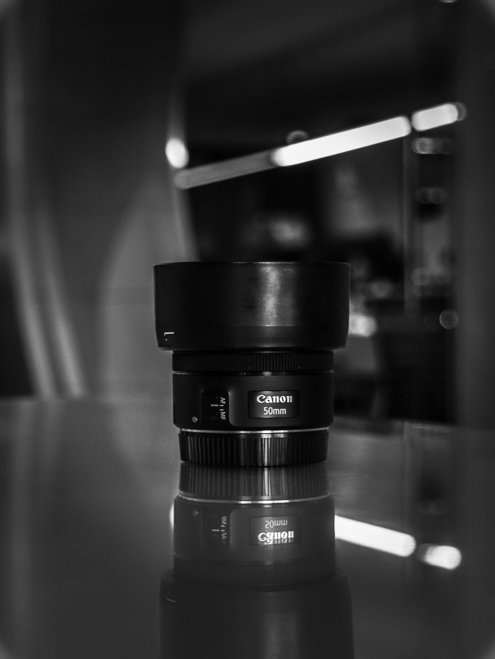 black camera lens on table