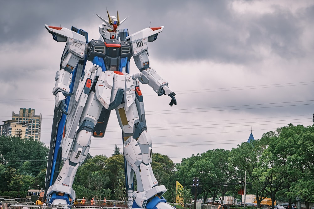 white and red robot statue