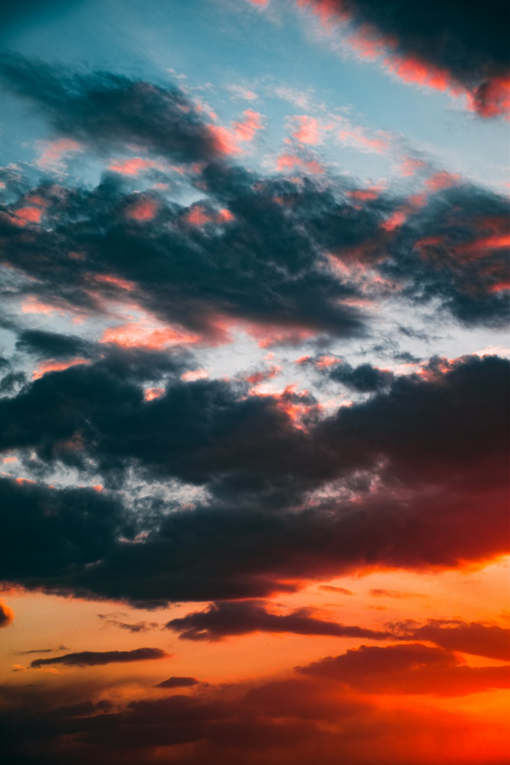 black clouds and orange sky