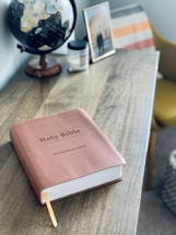 brown book on brown wooden table