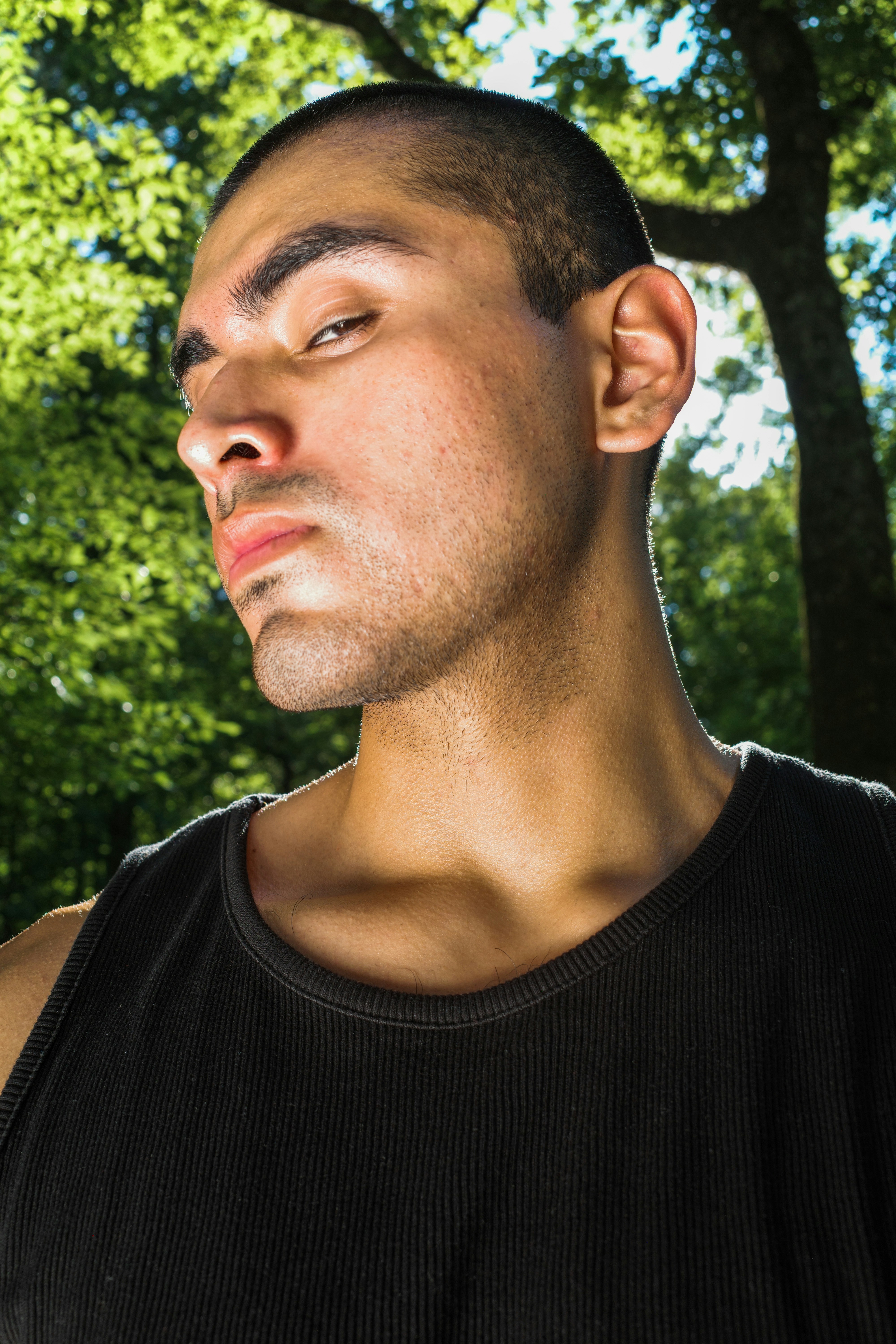 man in black tank top