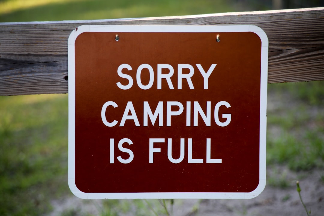 red and white no smoking sign, Photograph by Hayden Dunsel for www.florida-guidebook.com A campground sign in a Florida 