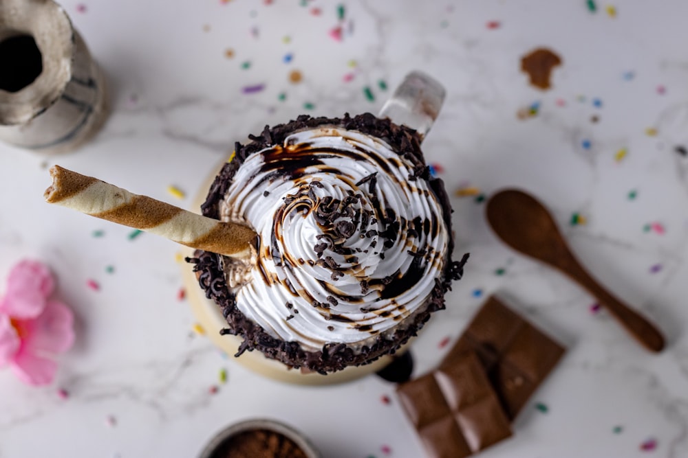 chocolate cake with white icing on top