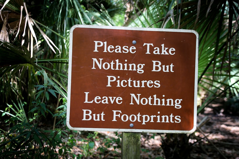 uma placa alertando as pessoas para não tirarem fotos