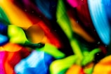 A vibrant resin art piece with swirling colors.