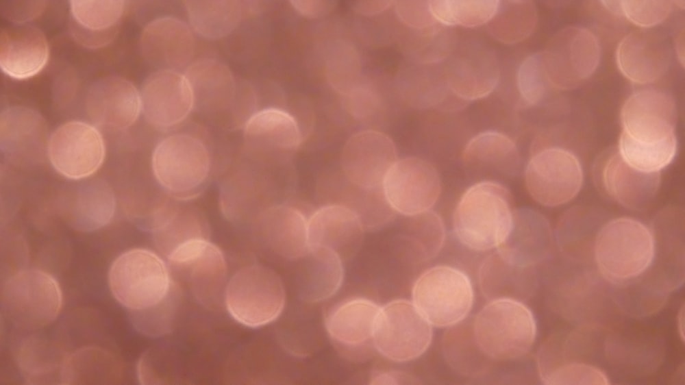 orange and white bokeh lights