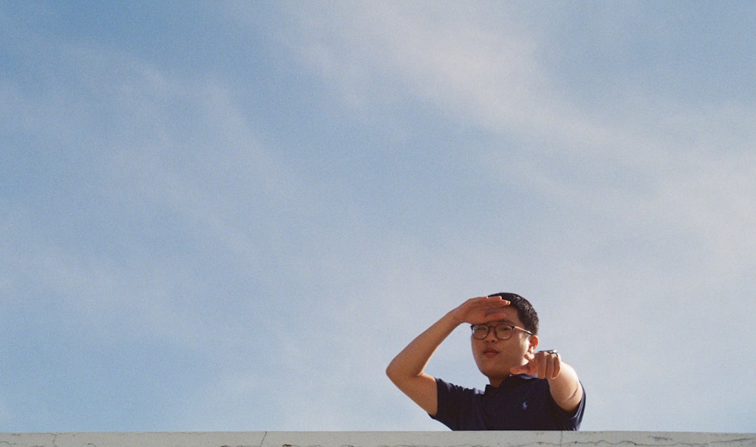 man in black shirt under white sky during daytime