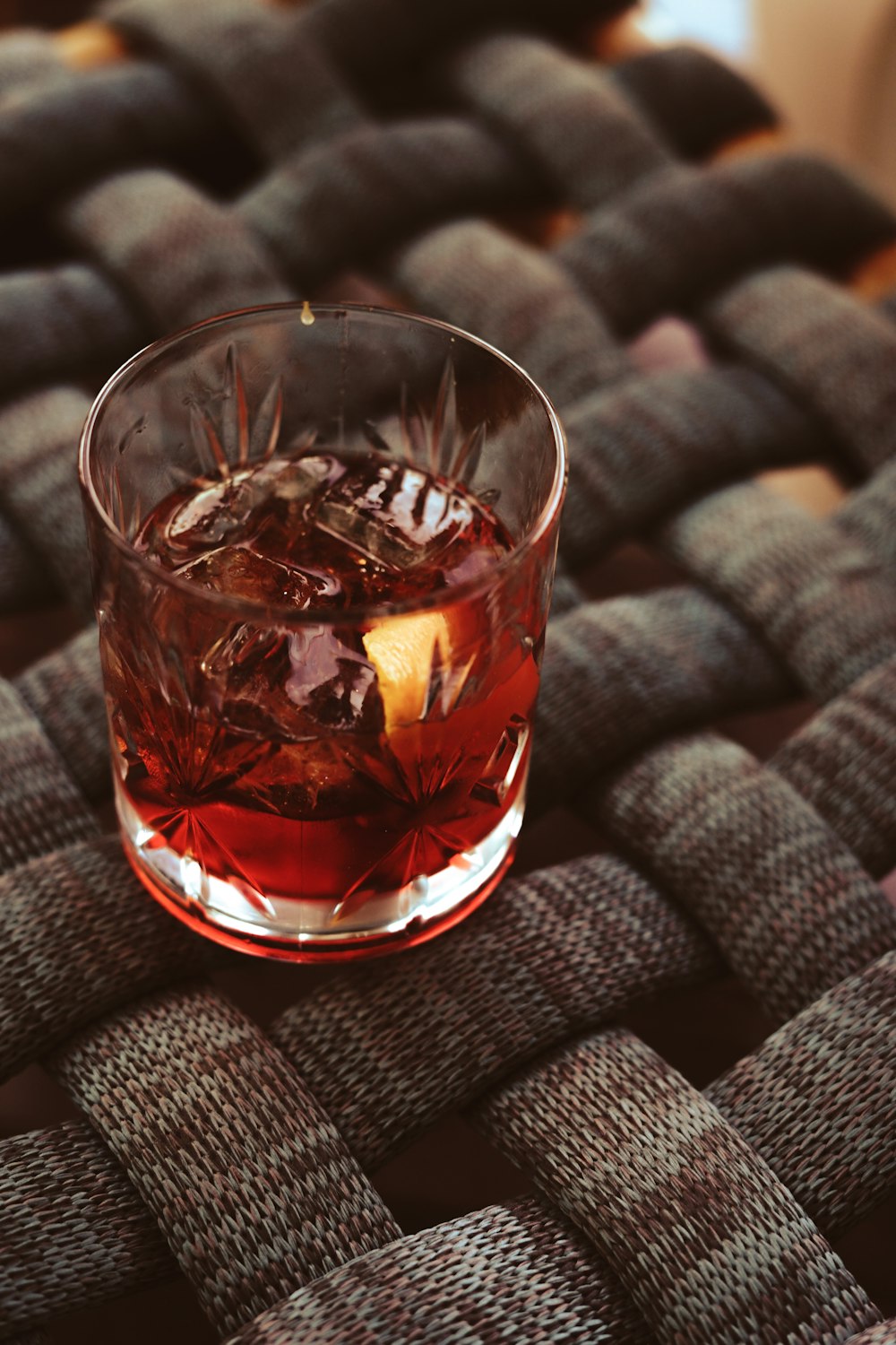 clear drinking glass with red liquid inside