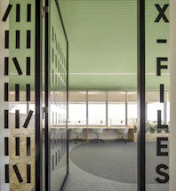 green and white glass building