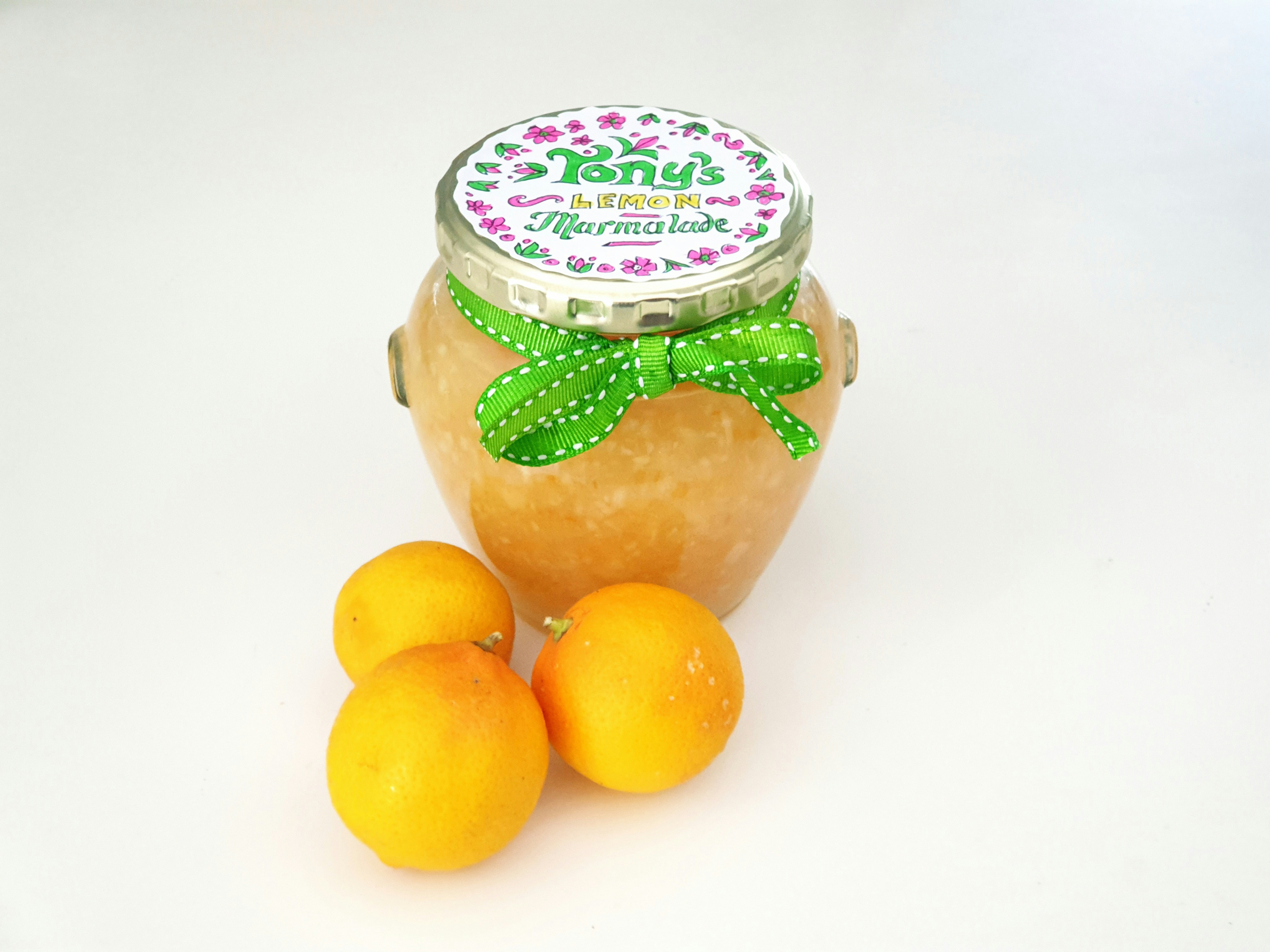 clear glass jar with yellow fruits