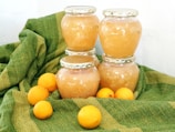 clear glass jar with yellow fruits