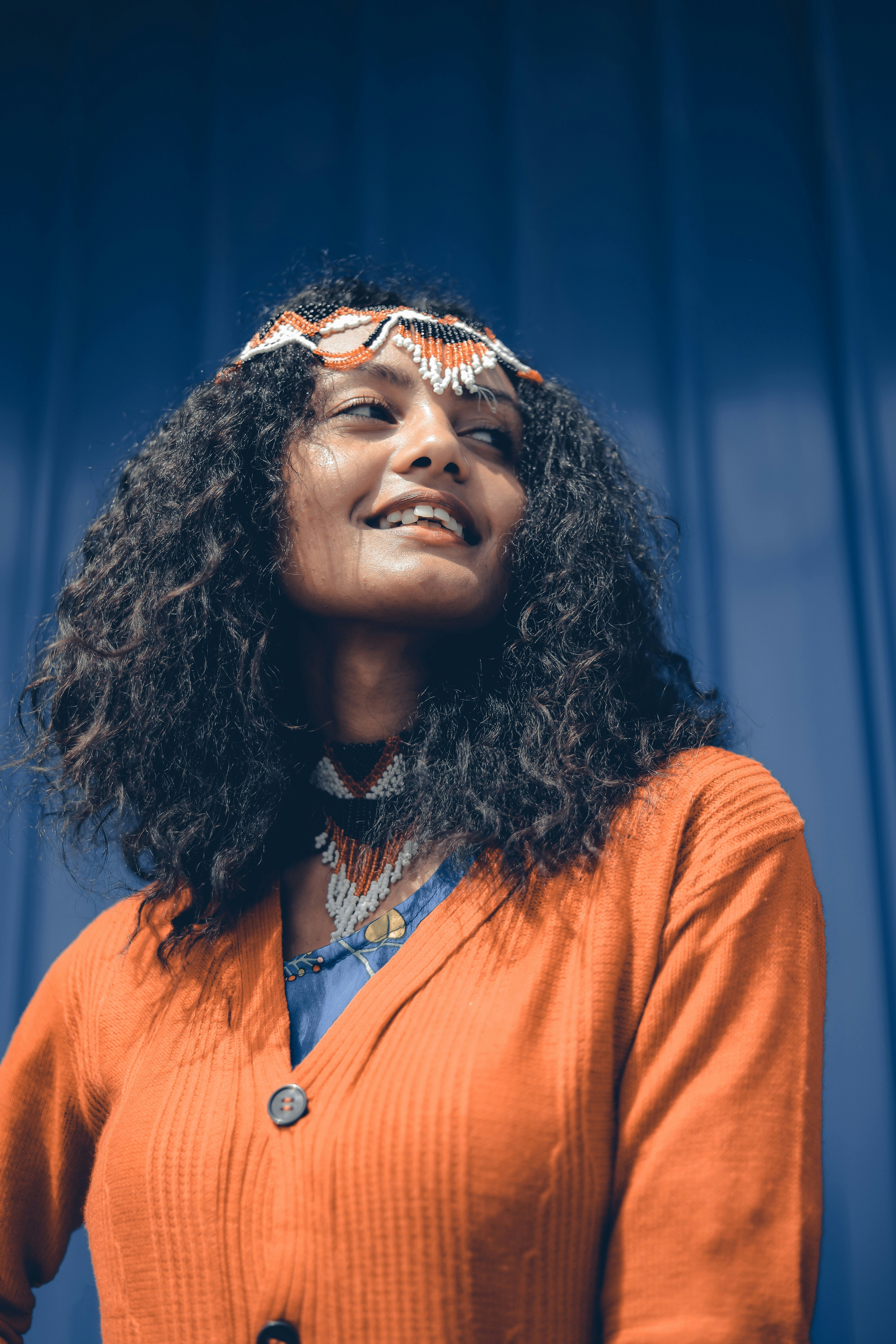 woman in orange button up shirt