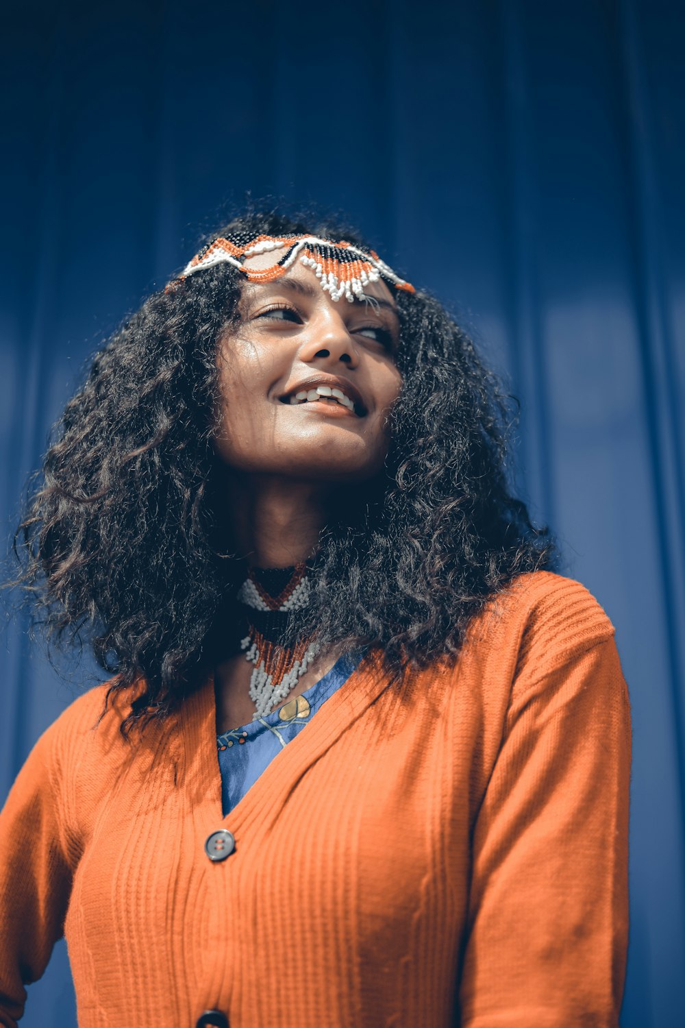 woman in orange button up shirt