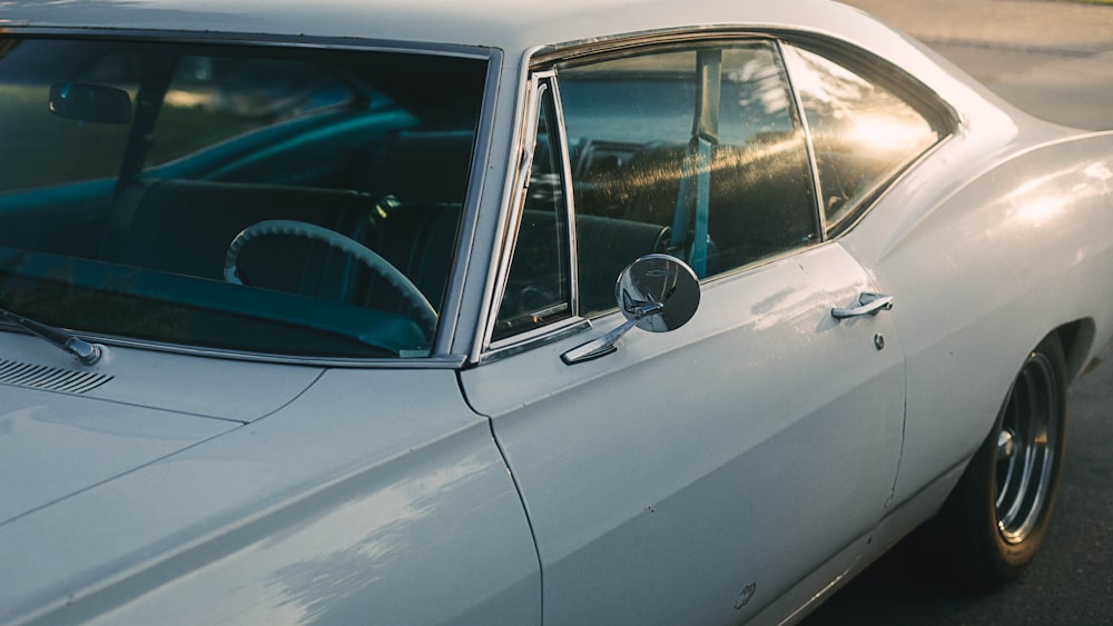 white car with white and black car door