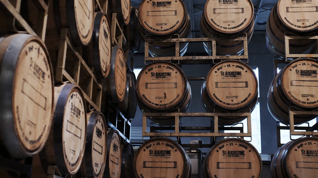 brown wooden barrels on brown wooden shelf,