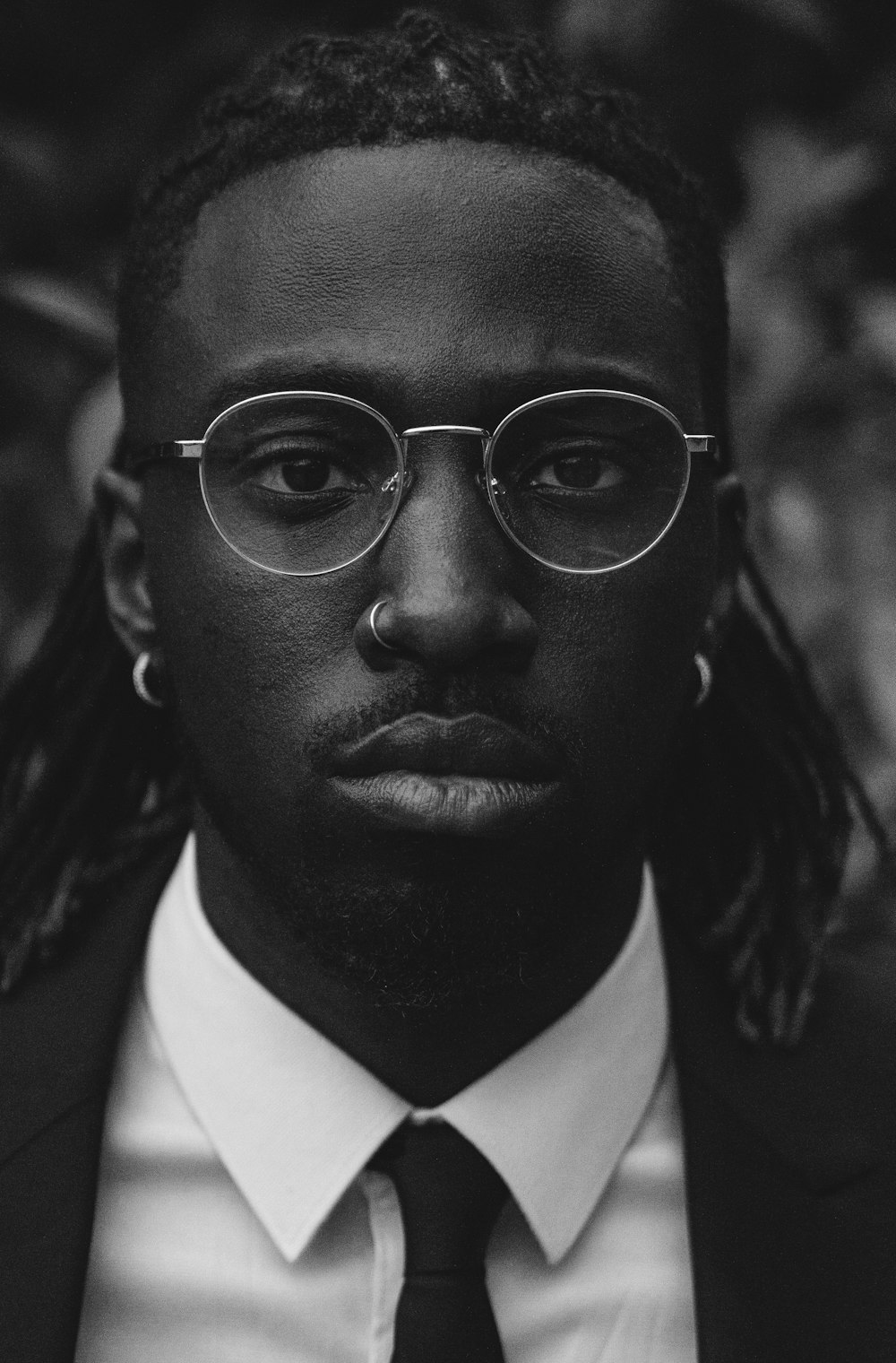 man in black framed eyeglasses