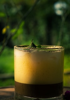 A person enjoying a drink made with phoodsco powder.