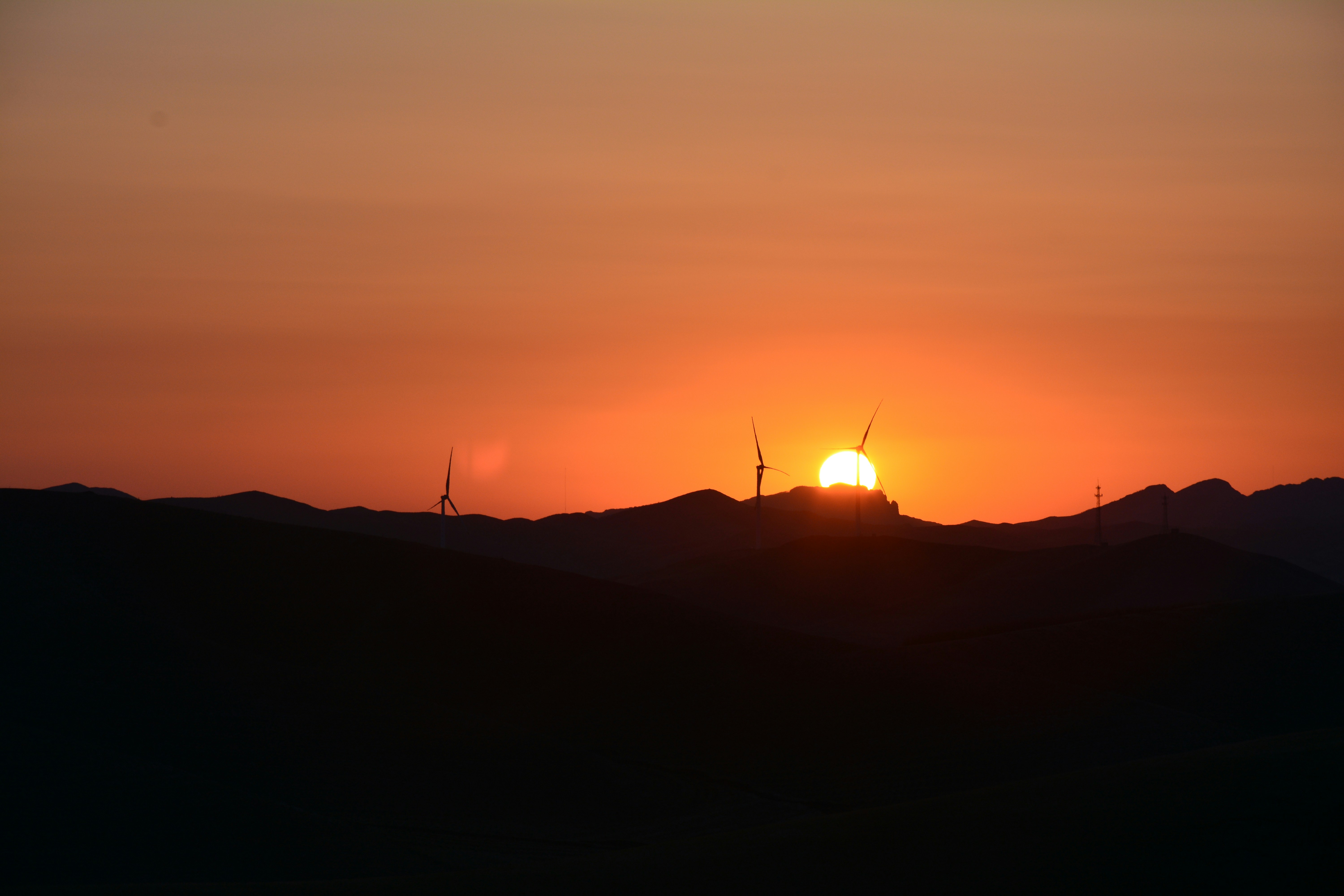 silhouette of mountain during sunset