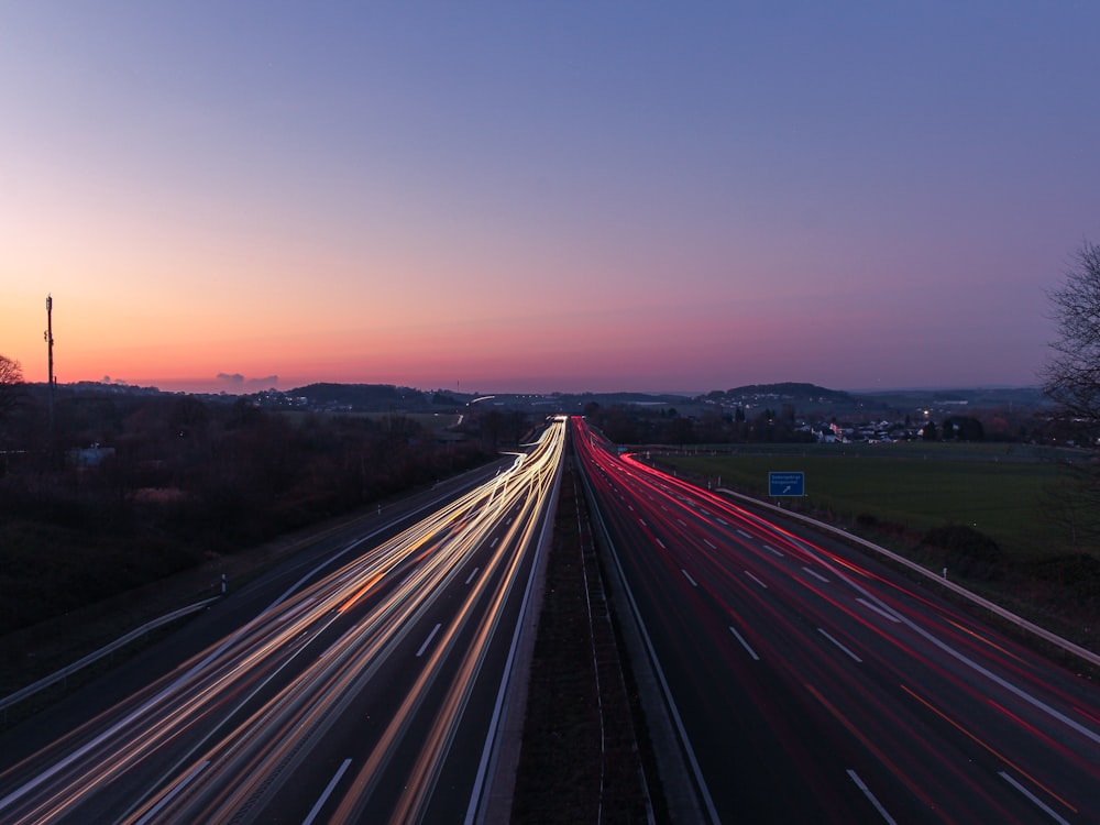 black asphalt road during sunset