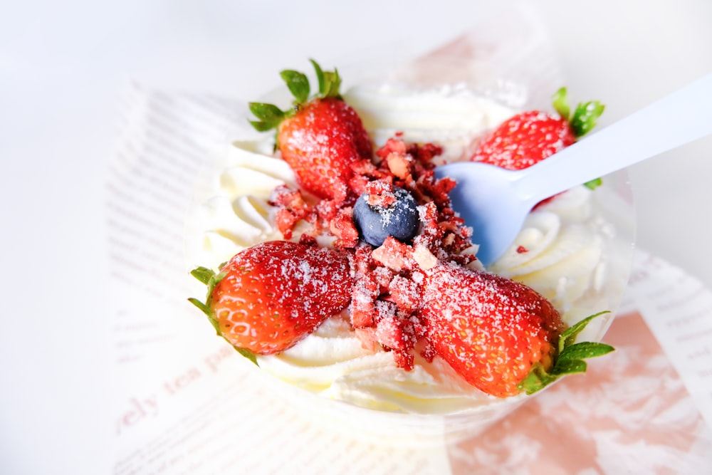 strawberry fruit on white ceramic plate