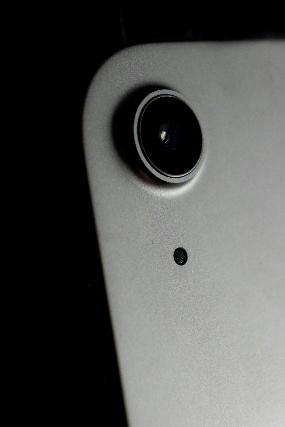 black round device on white surface