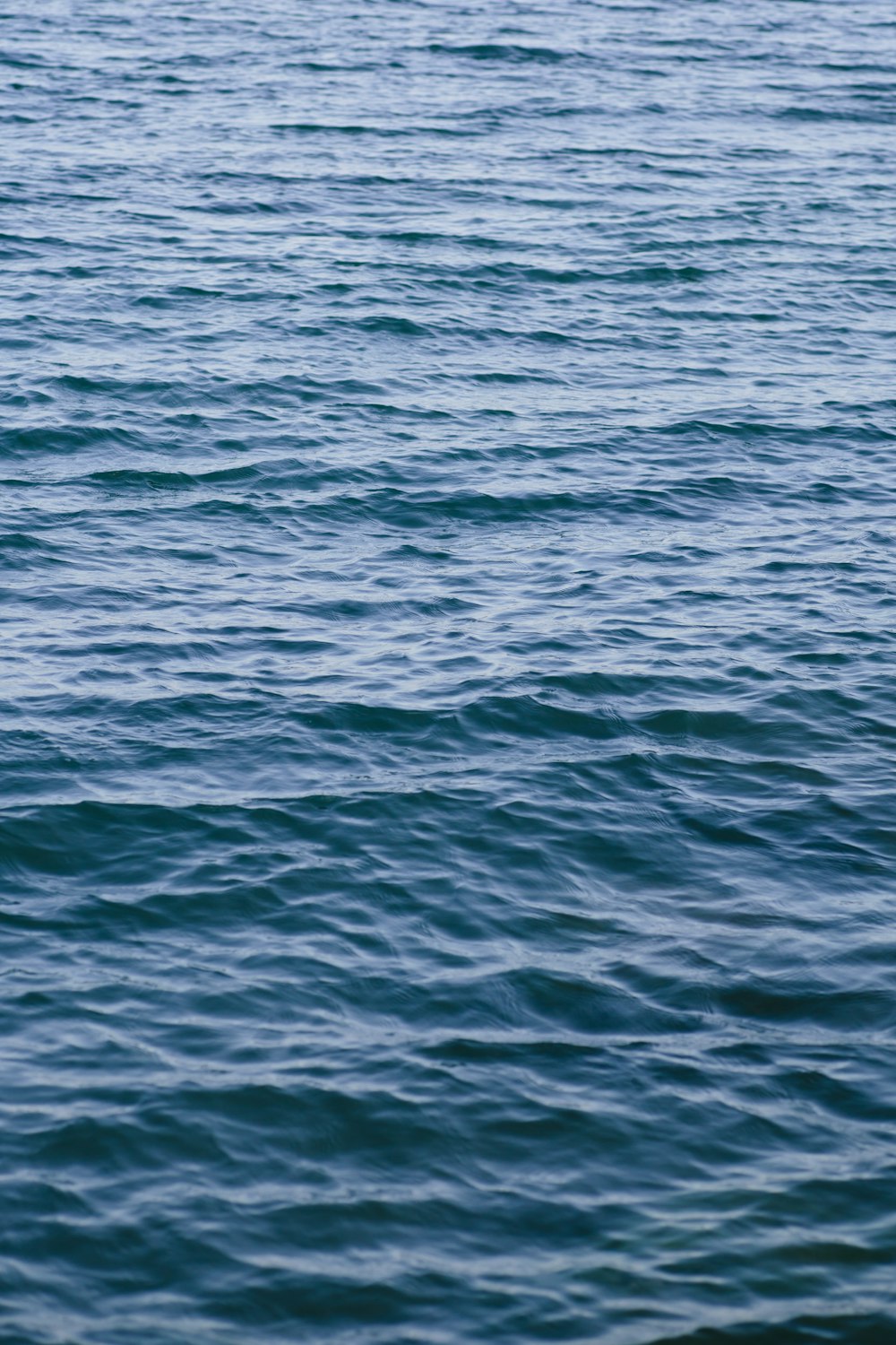 blue sea water during daytime