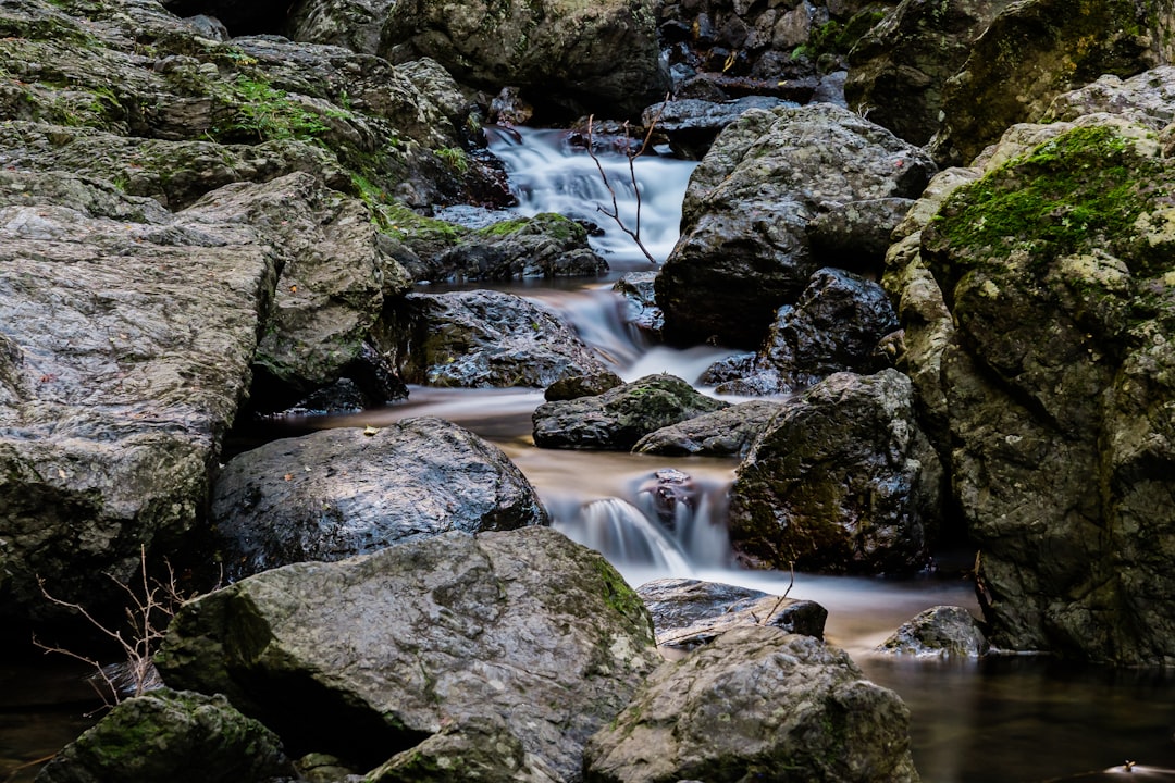 time lapse photography of water falls