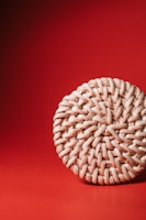 Close-up of a colorful woven basket freshly crafted on a wooden table