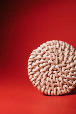 Close-up of a vibrant handwoven basket with traditional African patterns.