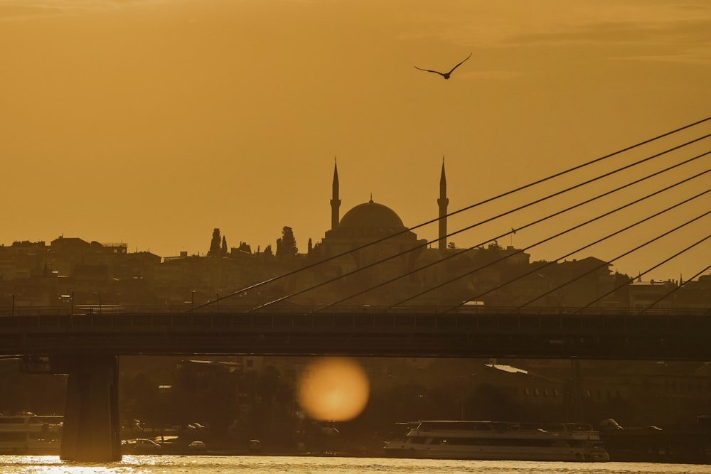 silhouette of bridge during sunset