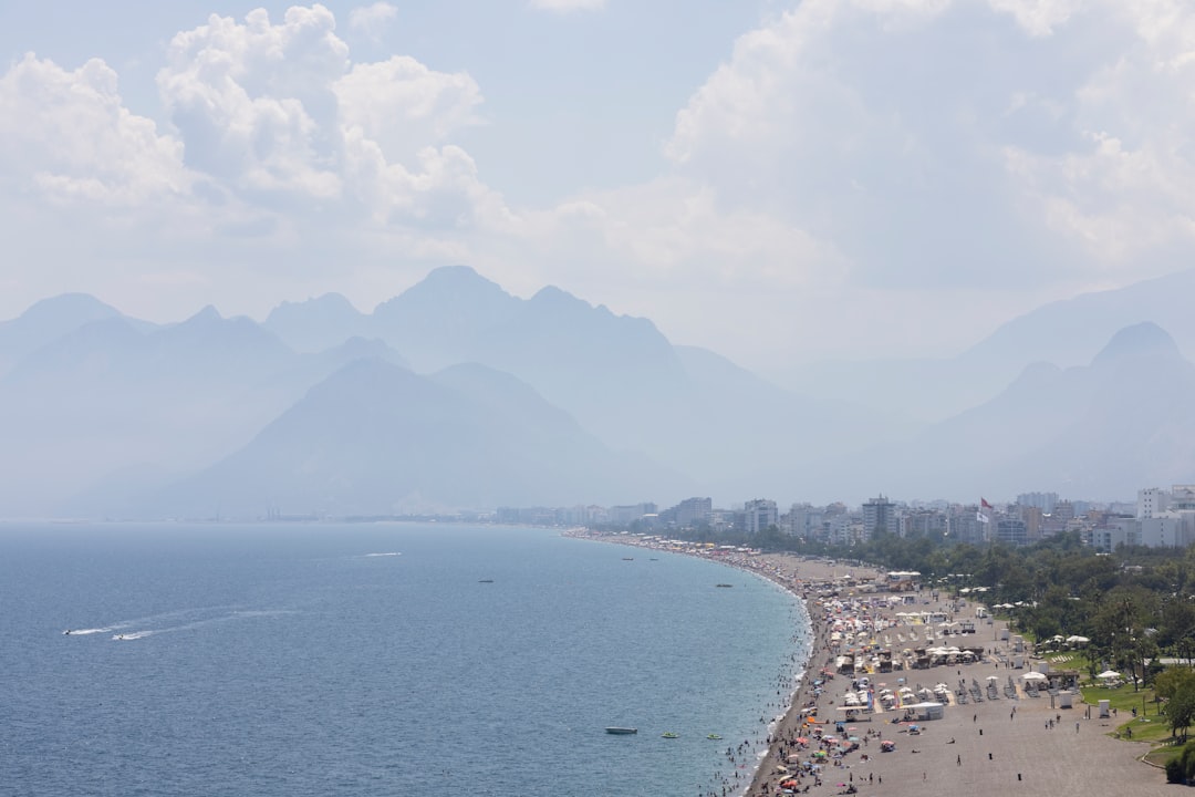 aerial view of sea and mountain during daytime