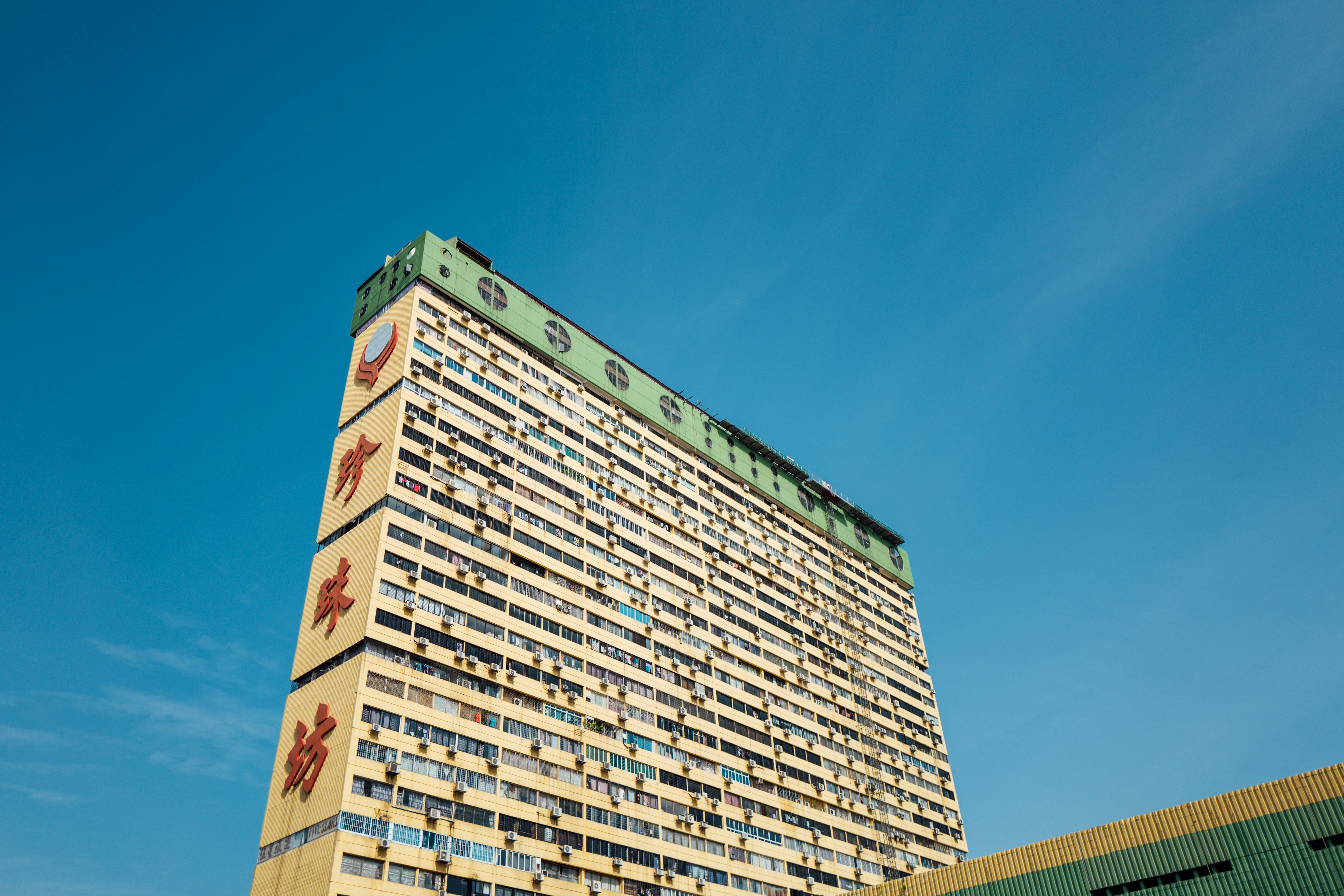white concrete building under blue sky during daytime