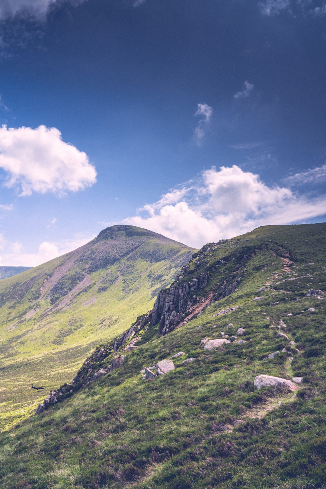 green mountain under blue sky during daytime