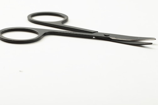 Close-up of surgical scissors and needle holders.