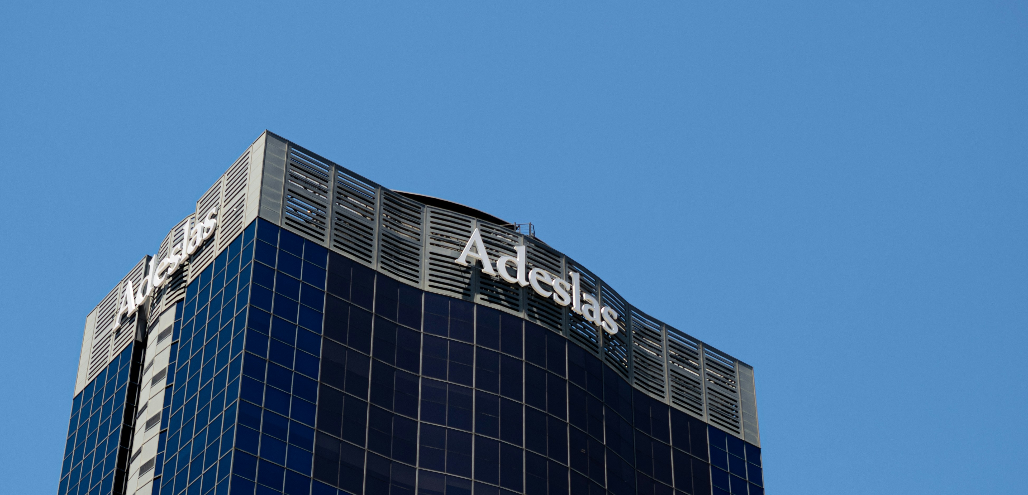 black and white building under blue sky during daytime