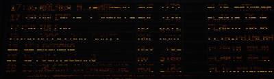 A dark-themed digital dashboard with neon yellow highlights glowing.