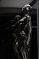 stainless steel robot toy in close up photography