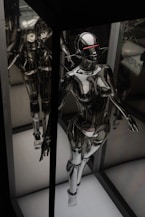 black and silver robot action figure