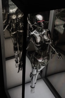 black and silver robot action figure