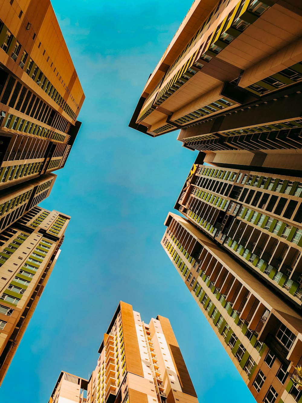 low angle photography of high rise building