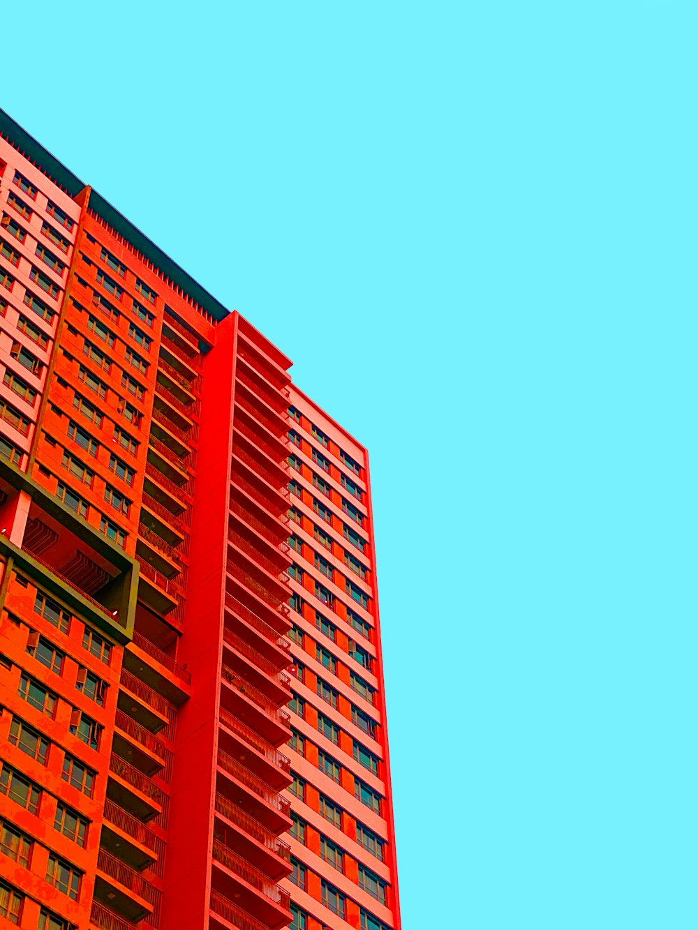 red concrete building under blue sky during daytime