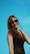 woman in black tank top wearing black sunglasses