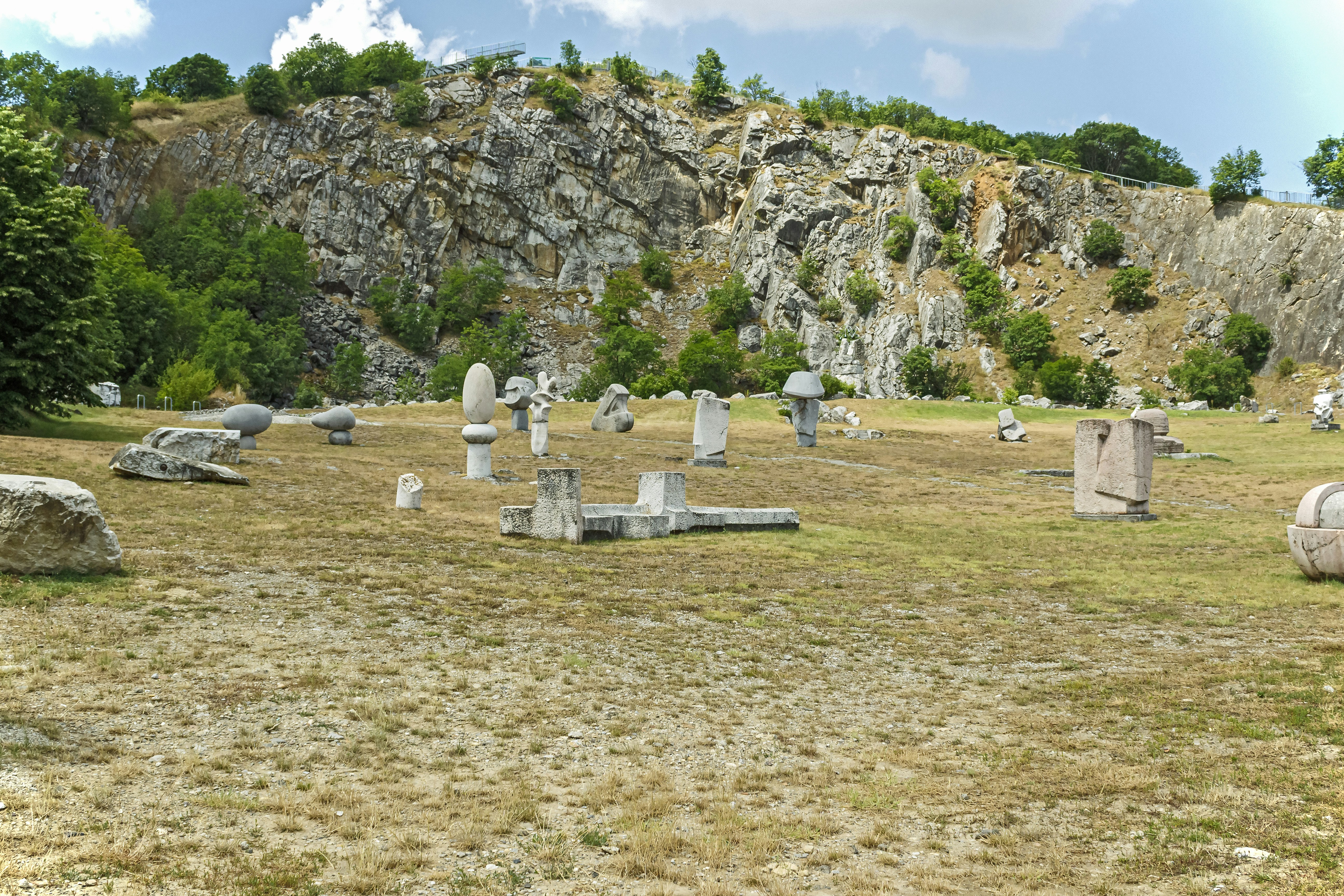 white stone on green grass field during daytime